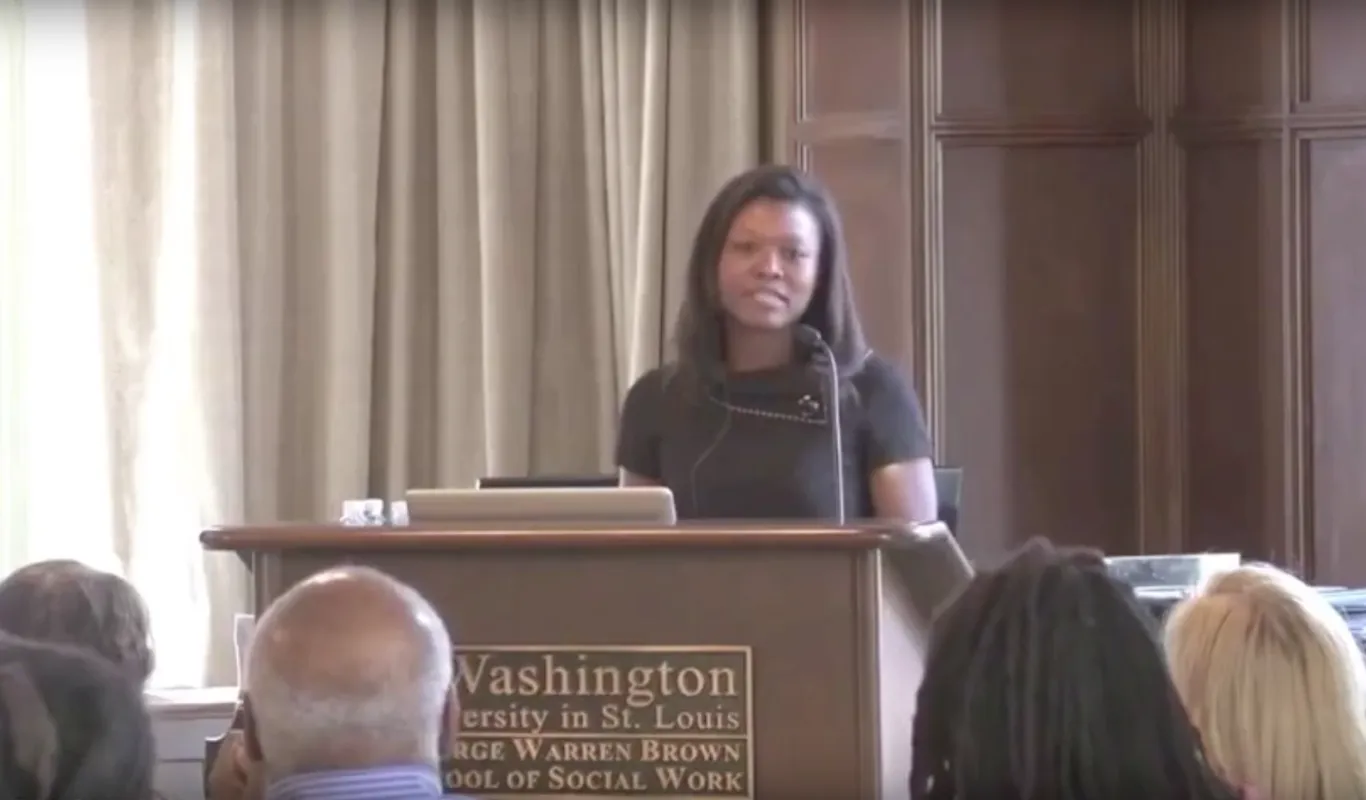 Koritha Mitchell at podium